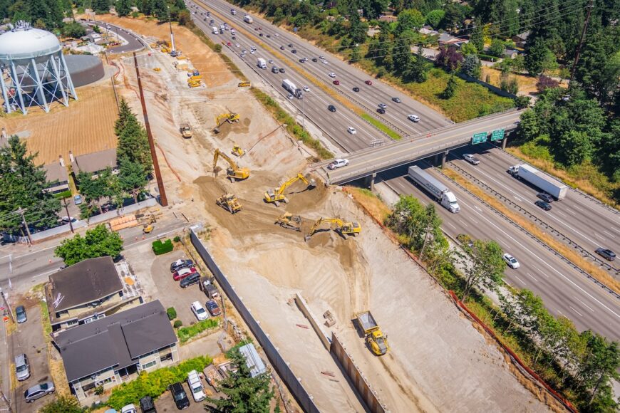 F200 aerial picture of all kinds of construction equipment working along I5