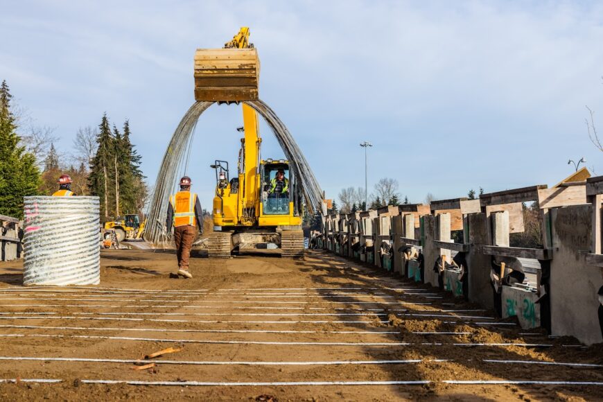 F200 excavator lifting rebar used for MSE wall installation