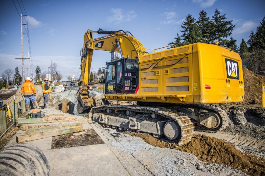 F200 large excavator excavating trench