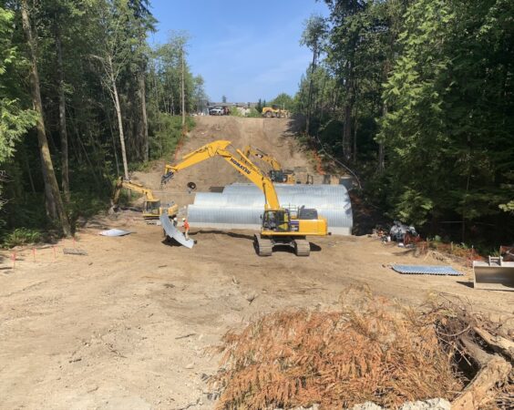 Harbour Reach excavator and new steel pipe culvert