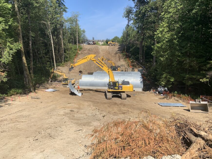 Harbour Reach excavator and new steel pipe culvert