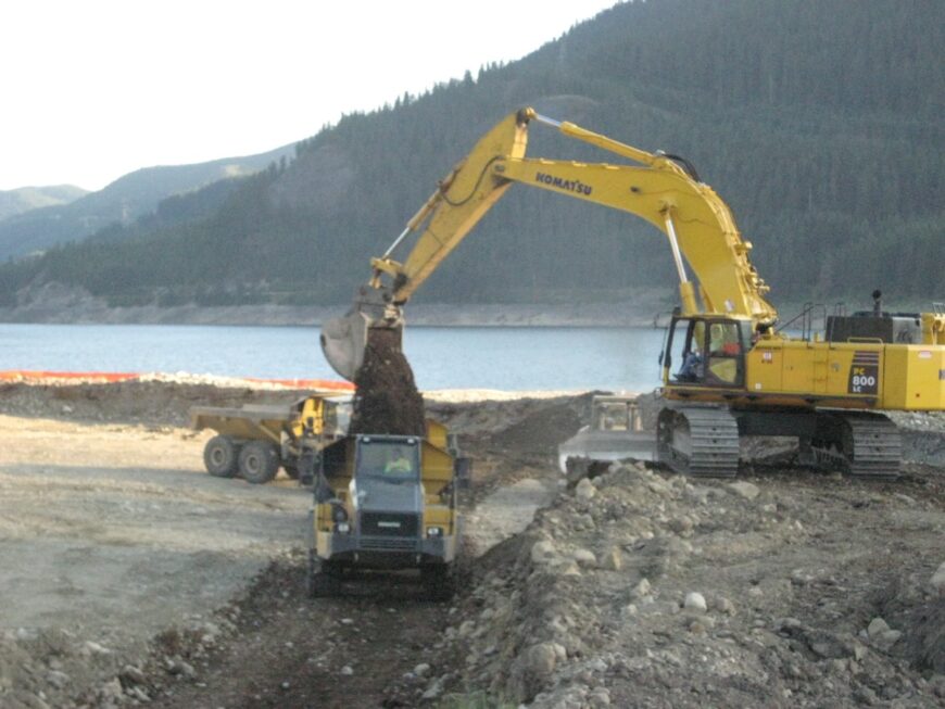The Hyaks Excavator loading haul truck near Lake Keechelus