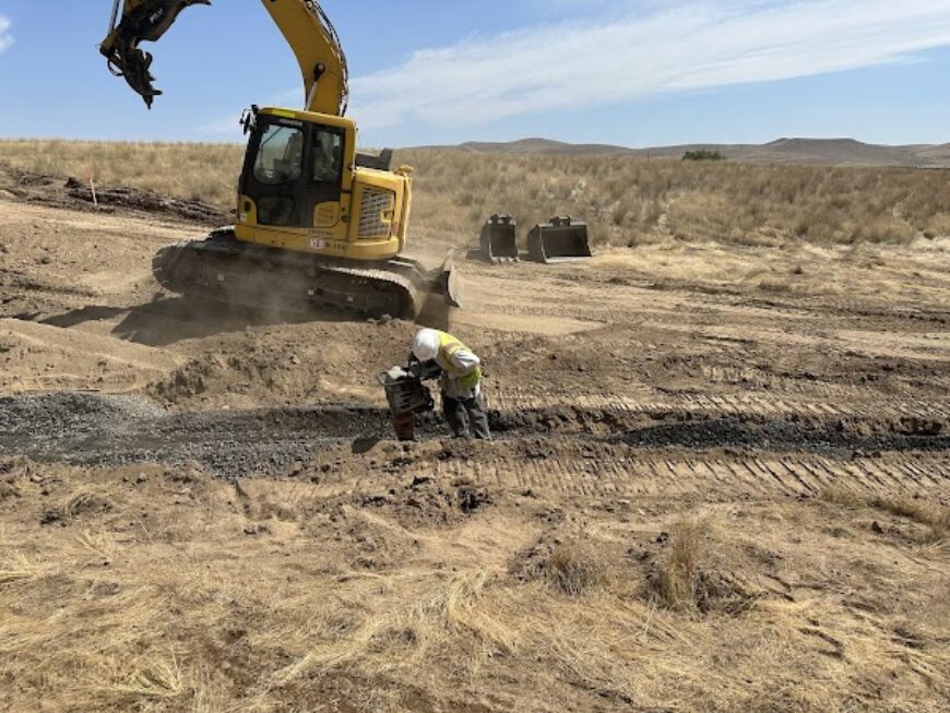 Moxee running a jumping jack in a culvert trench