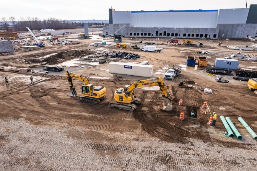 Project Roxy aerial picture of excavators and pipe crew