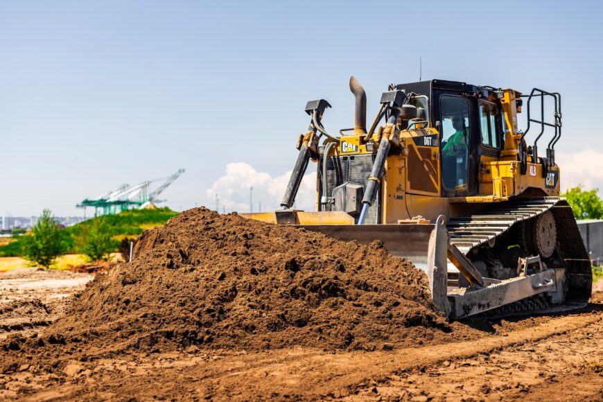 SR167 dozer pushing dirt