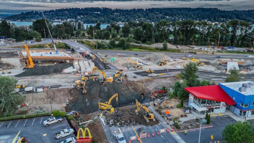 B2R mass excavation for installation of concrete culvert. Lots of equipment and crew working