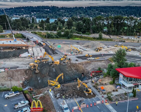 B2R mass excavation for installation of concrete culvert. Lots of equipment and crew working