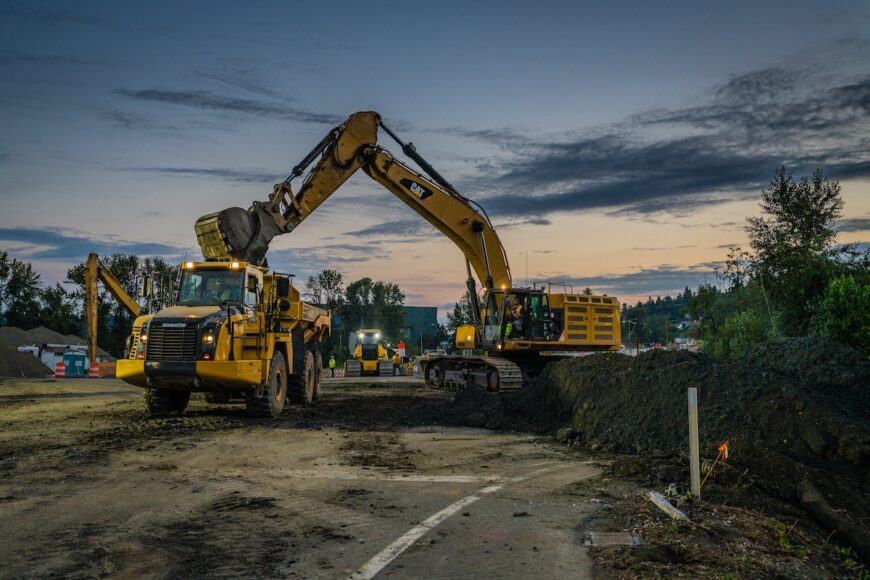 B2R excavator loading haul truck during mass excavation