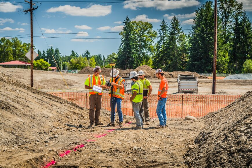 Group of workers meeting on a job site